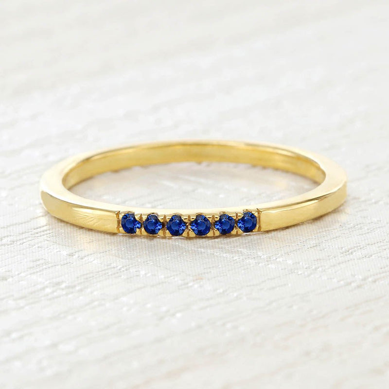 Nisha sapphire and yellow gold wedding ring