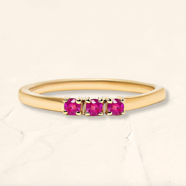 Tina ring set with three rubies