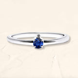 Ring with sapphire and white diamond in white gold