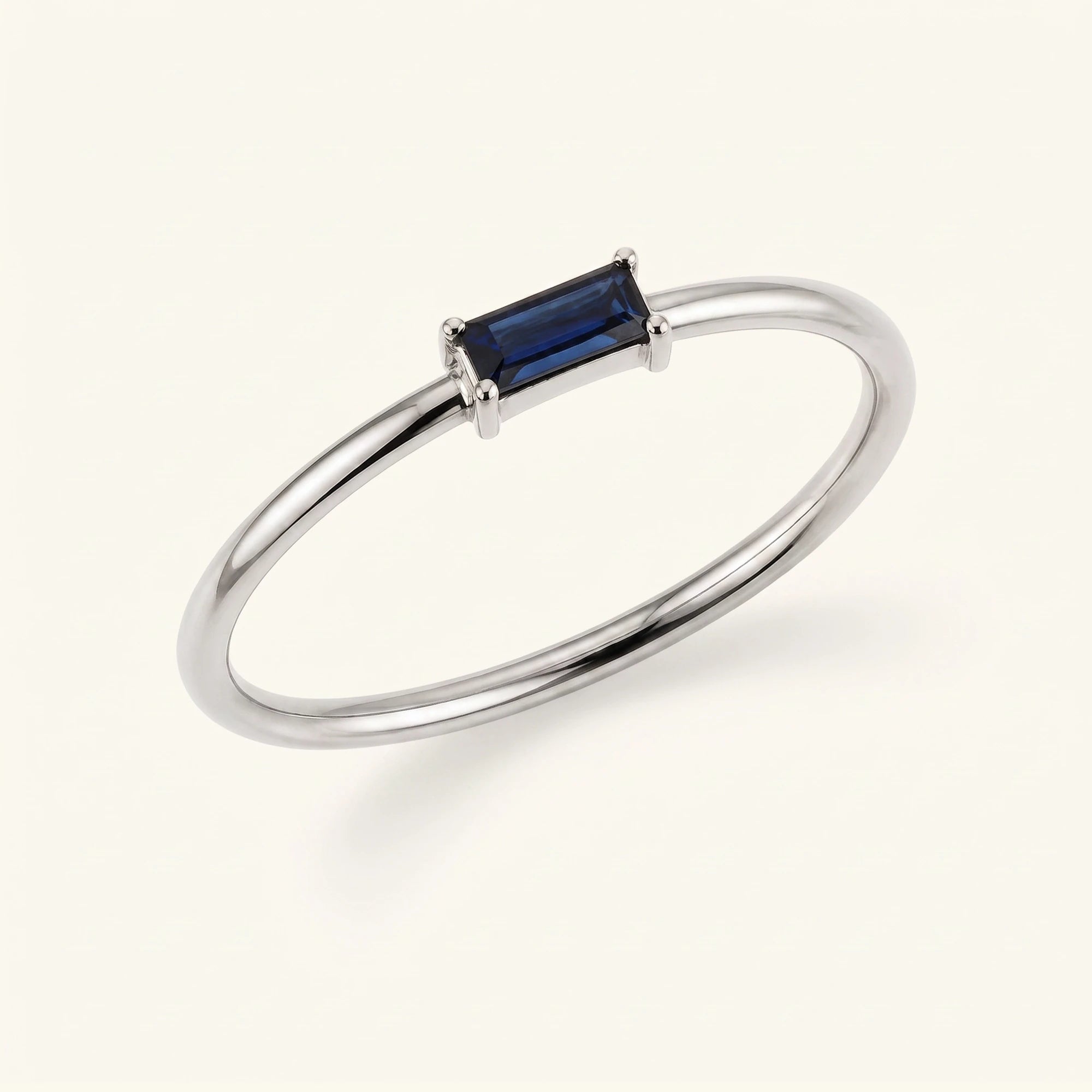 bague solitaire saphir taille baguette or blanc