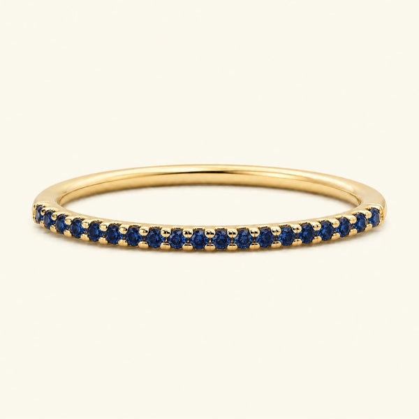 Bague éternité saphir demi-tour pavée en or jaune