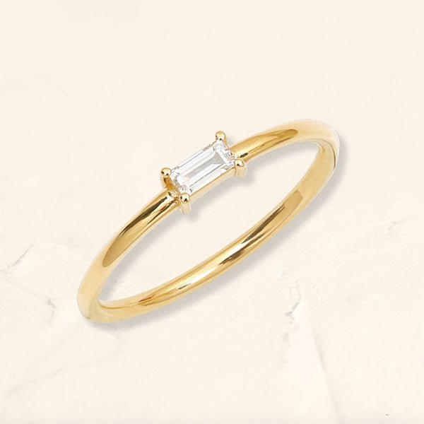 Shanti baguette diamond solitaire ring in yellow gold