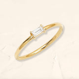 Shanti baguette diamond solitaire ring in yellow gold