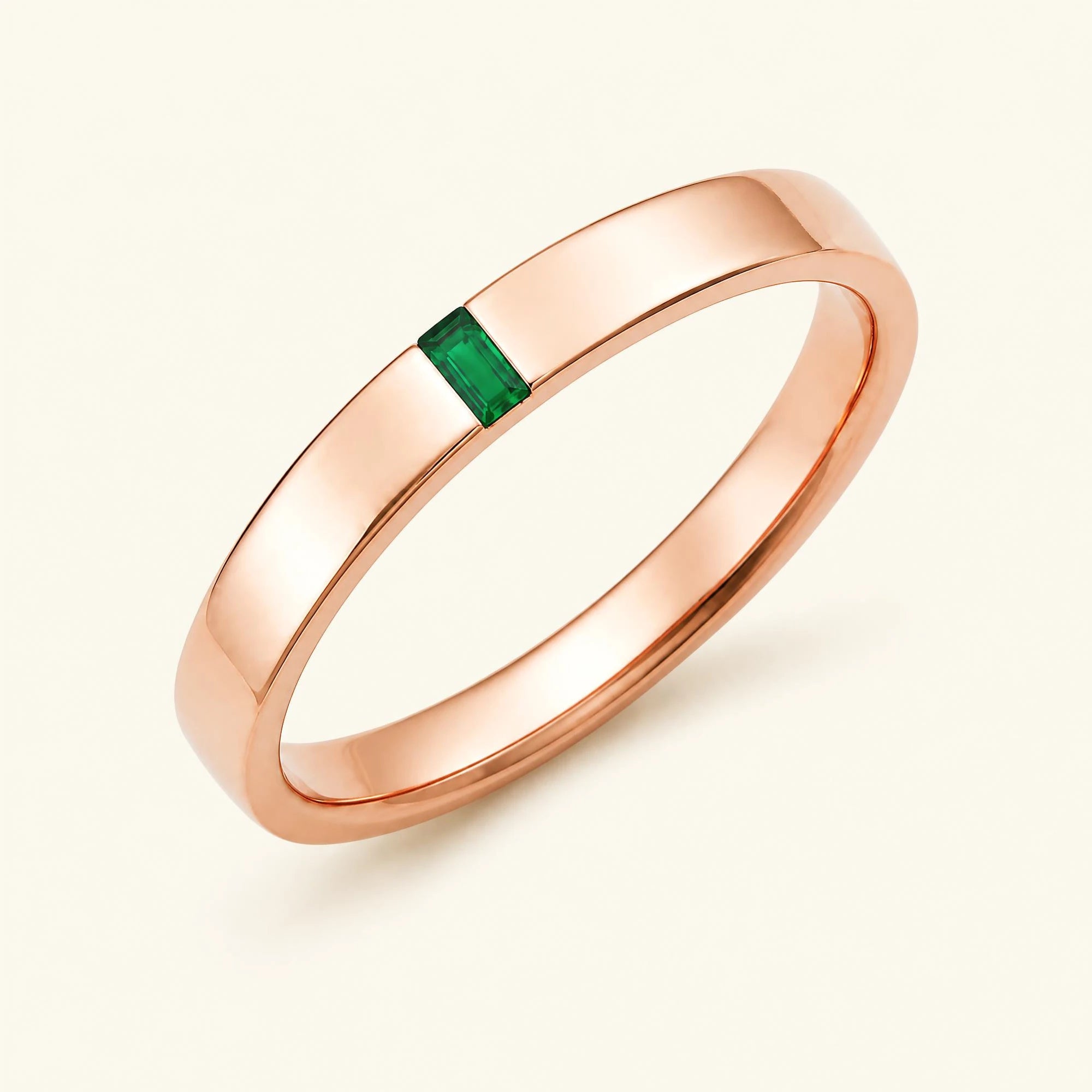 Bague solitaire baguette d'émeraude pour homme en or rose