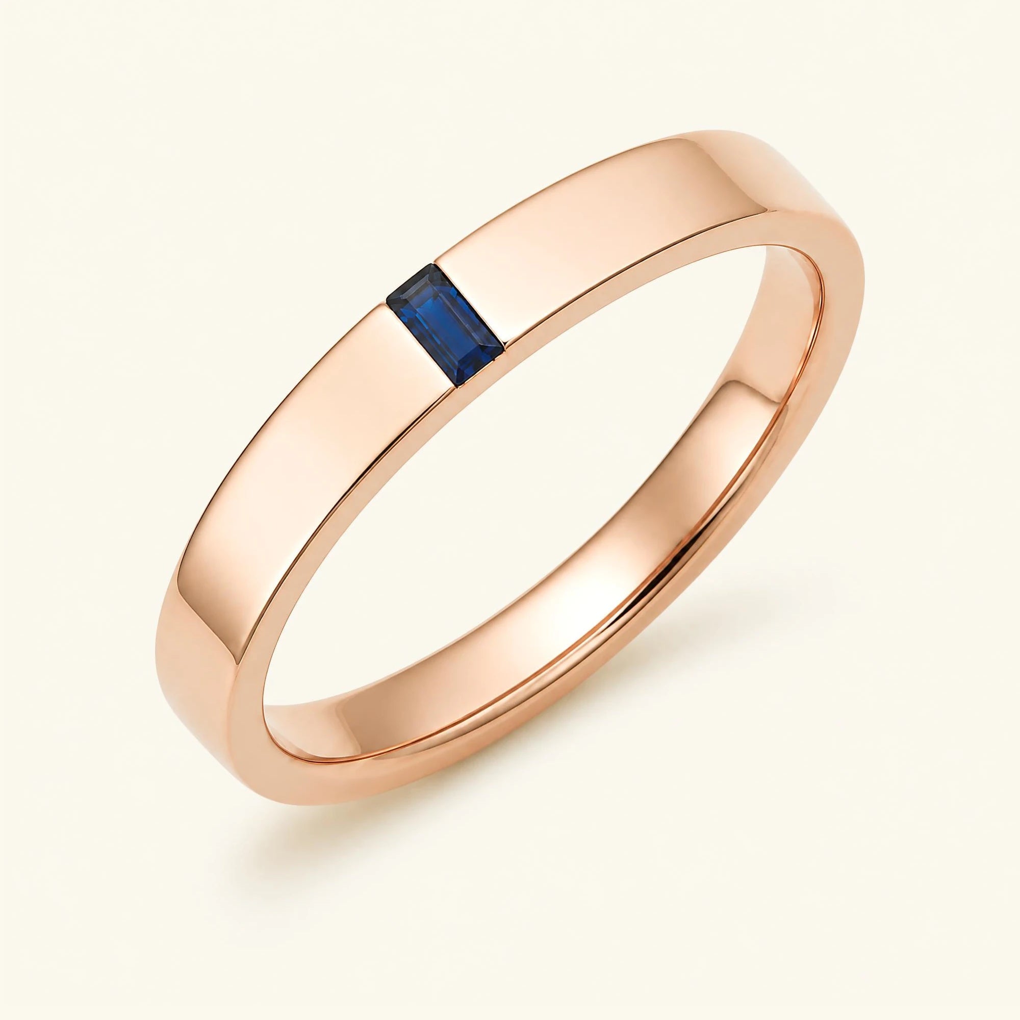 Bague solitaire baguette de saphir pour homme en or rose