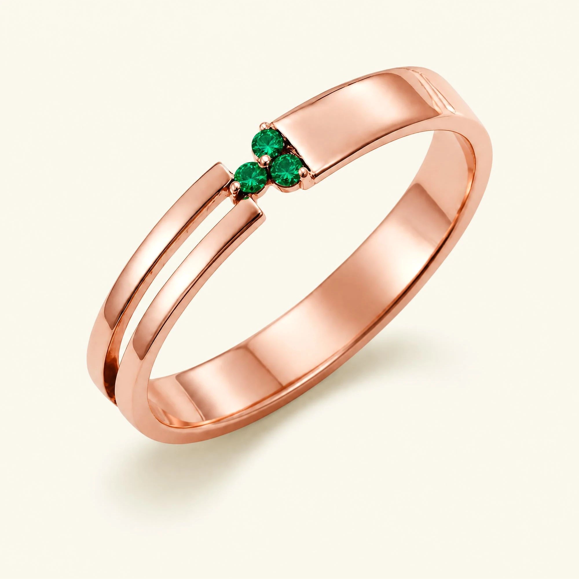 Bague trois pierres d'émeraudes pour homme en or rose