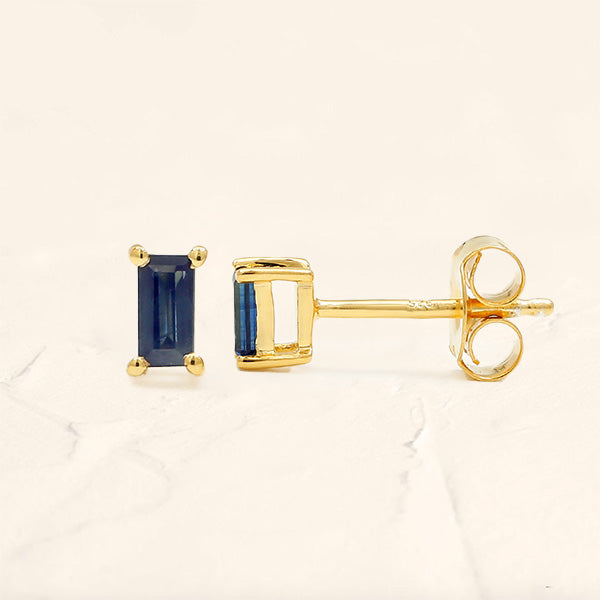 Baguette cut sapphire earrings in yellow gold