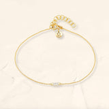 Pulsera Shanti de oro de 18 quilates engastada con un diamante