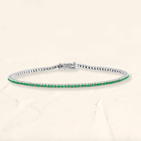 Bracelet tennis rivière émeraude en or blanc 18cts