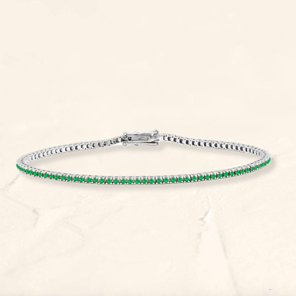 Bracelet tennis rivière émeraude en or blanc 18cts