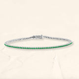 Tennis bracelet emerald river in white gold 18cts