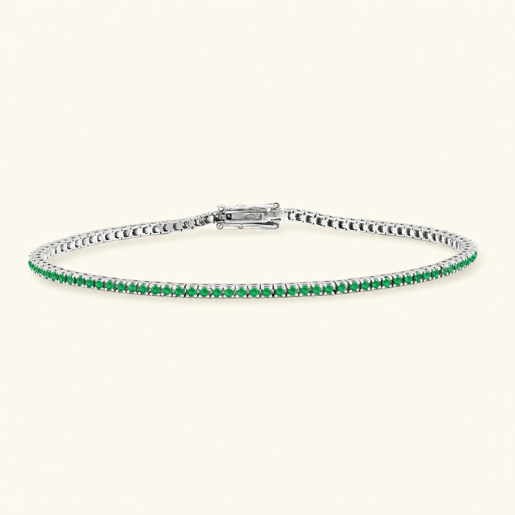 Bracelet tennis rivière émeraude en or blanc 18cts