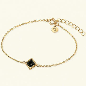 Bracelet solitaire diamant noir Indrani, princesse 4 mm sertie torsade sur chaîne fine en or jaune 18 carats