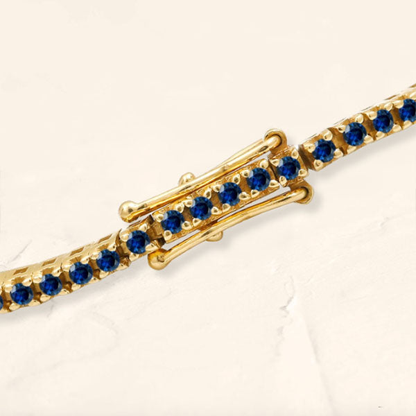 Sapphire tennis bracelet with double safety latch