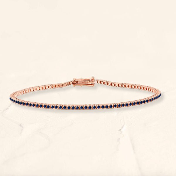 Bracelet tennis rivière en saphir et or rose 18cts