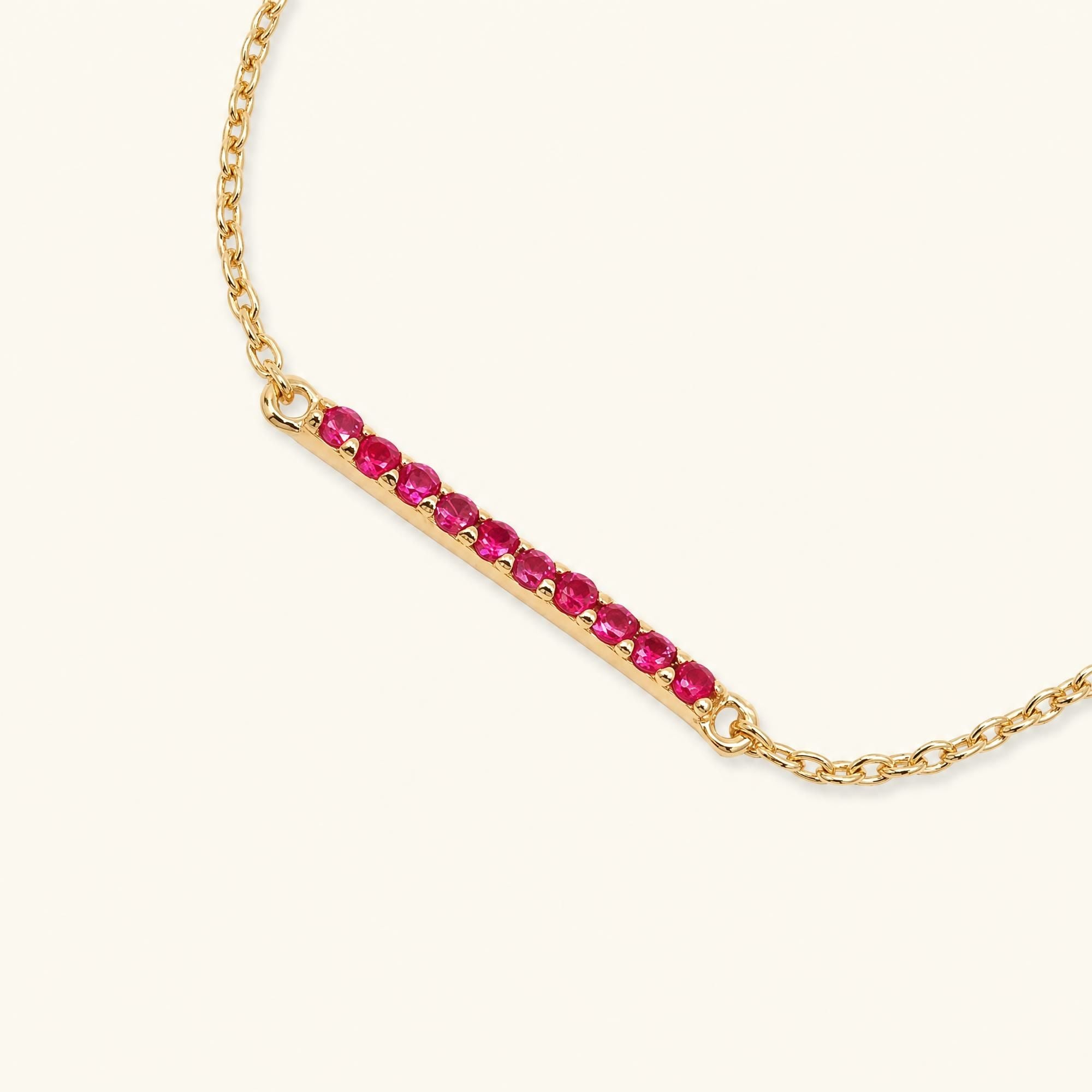 bracelet longue barre rubis en or jaune
