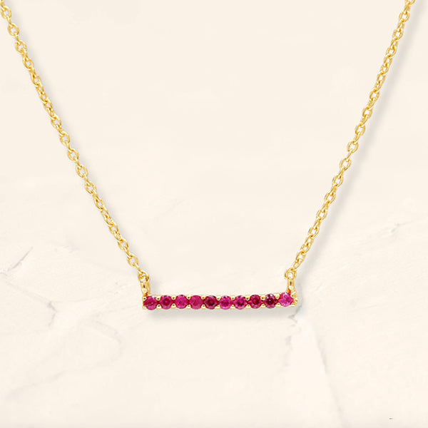 Ujala bar necklace in ruby and yellow gold