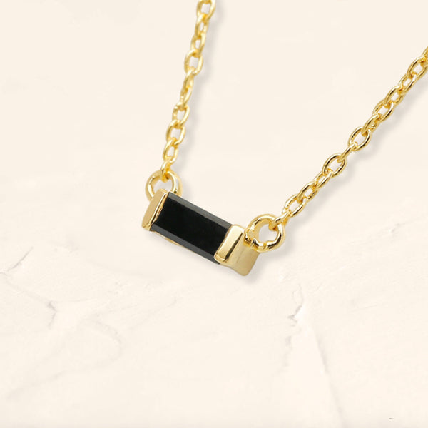 Shanti black diamond baguette necklace side view