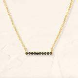 Ujala black diamond bar necklace in yellow gold