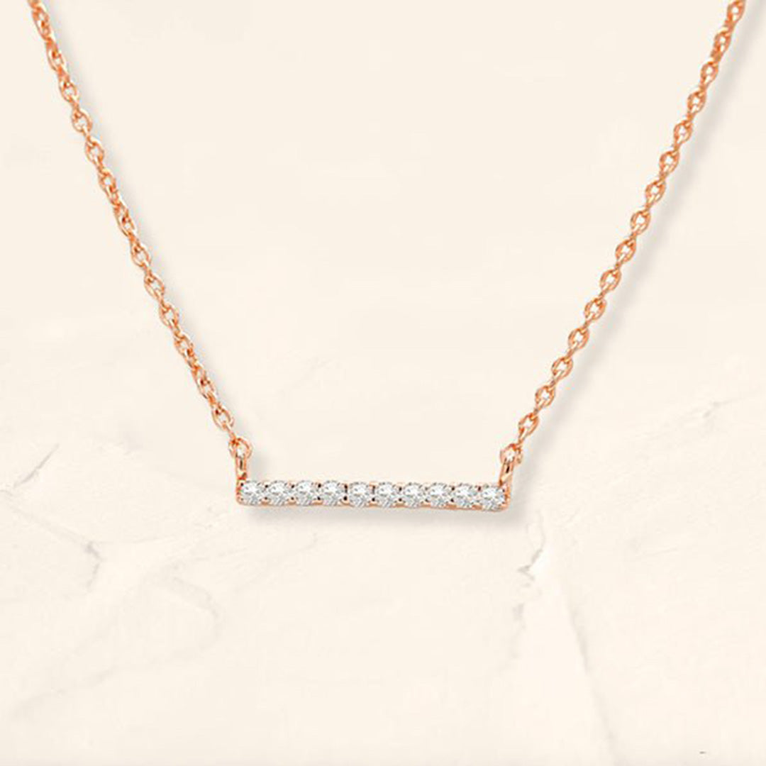 collar largo con barra de diamantes en oro rosa