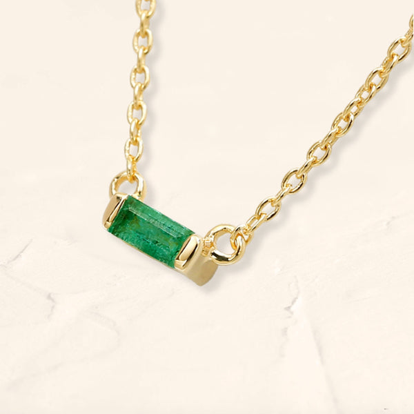 Shanti emerald baguette necklace in yellow gold side view