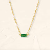 Shanti emerald baguette necklace in yellow gold