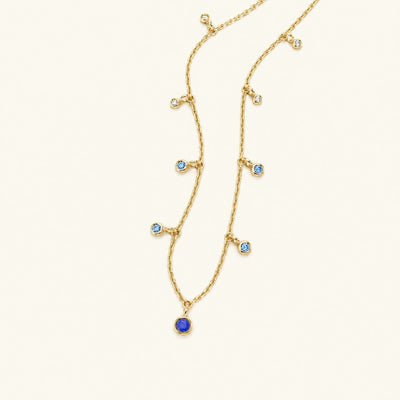 collier megha or jaune saphir