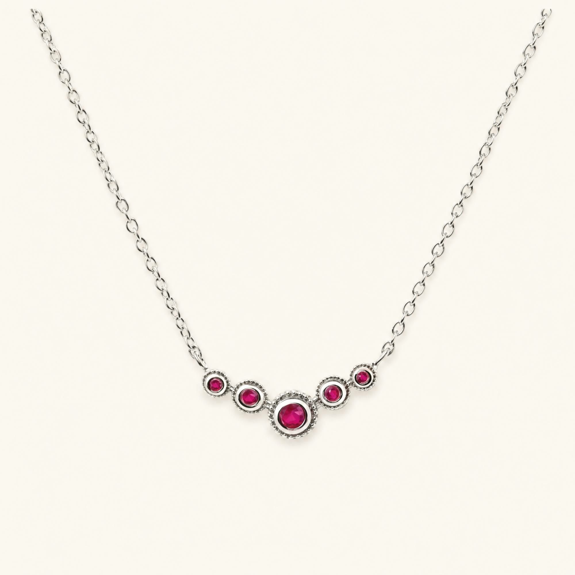Collier fin rivière de rubis en or blanc