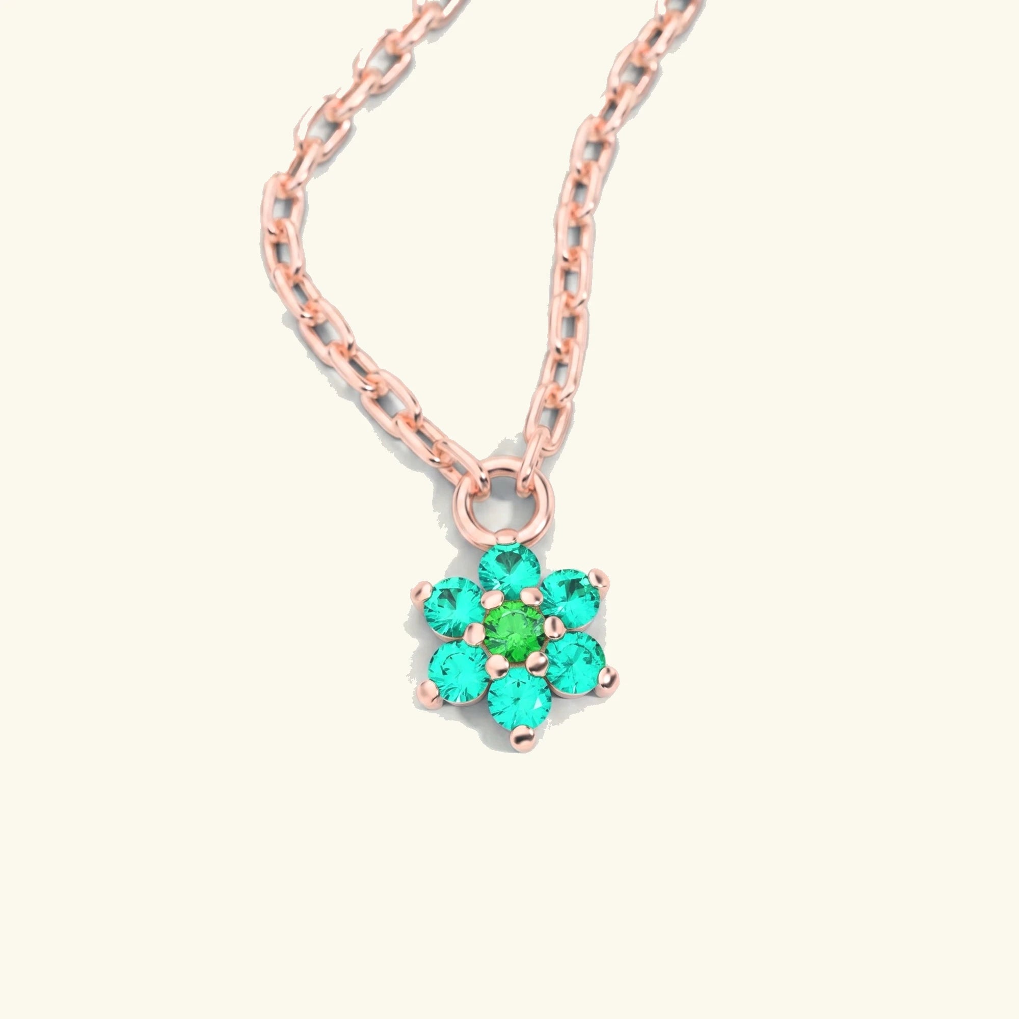 collier surya or rose emeraude