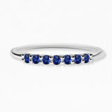 White gold vadha ring set with 7 sapphires