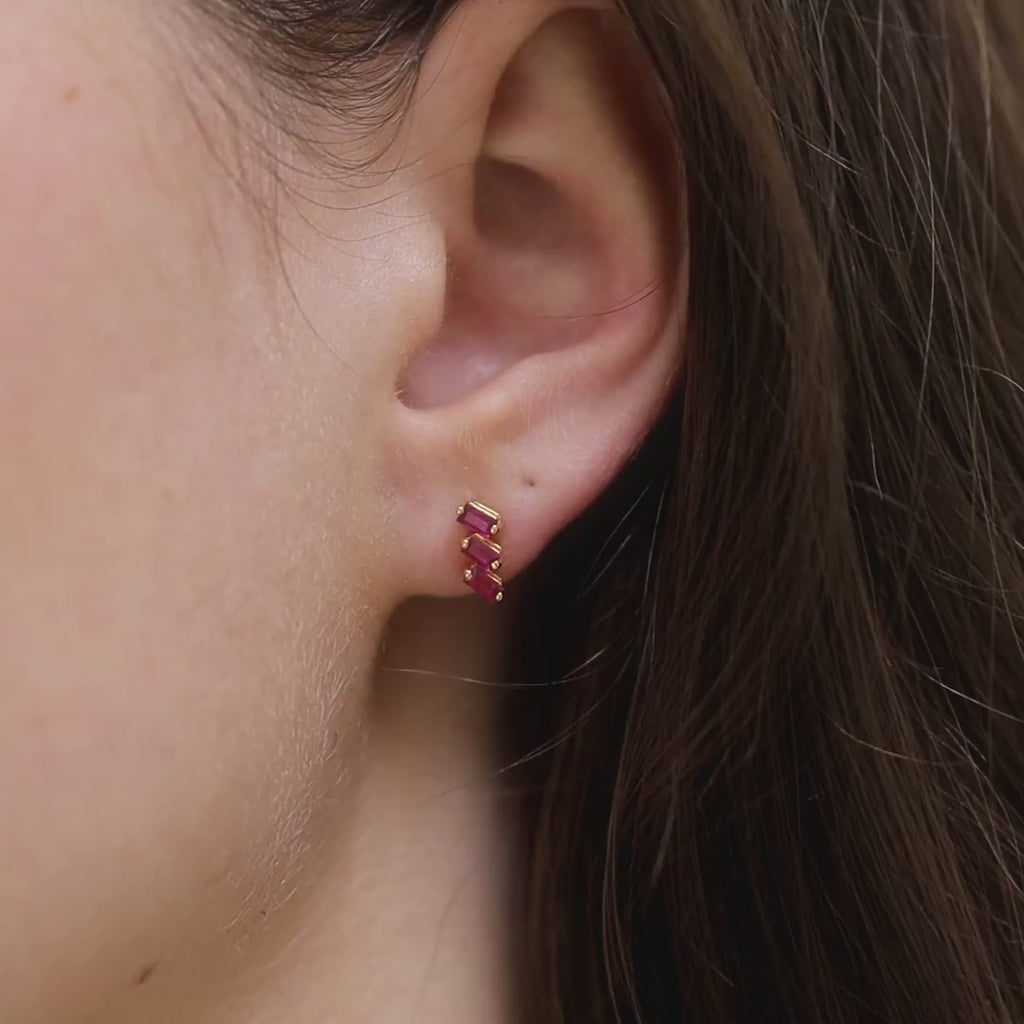 Jivane ruby baguette earrings on mannequin