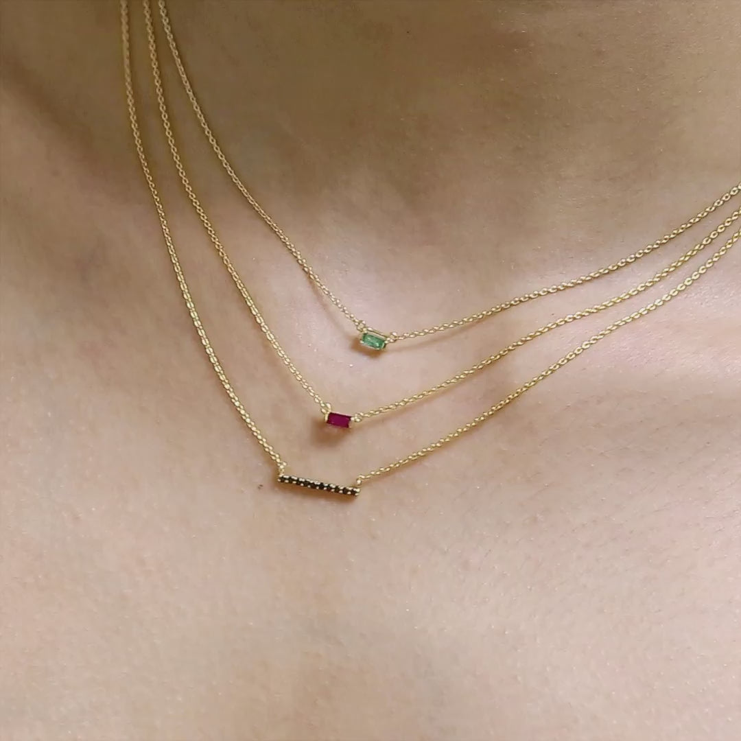 layering of fine gemstone necklaces