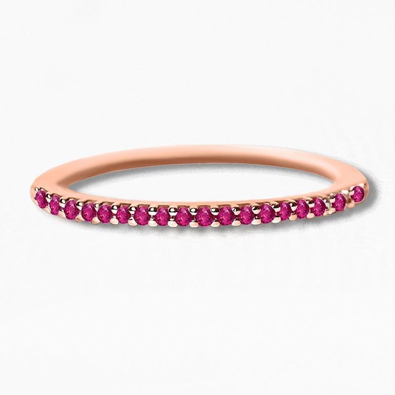 Eternity wedding band paved with rubies and rose gold