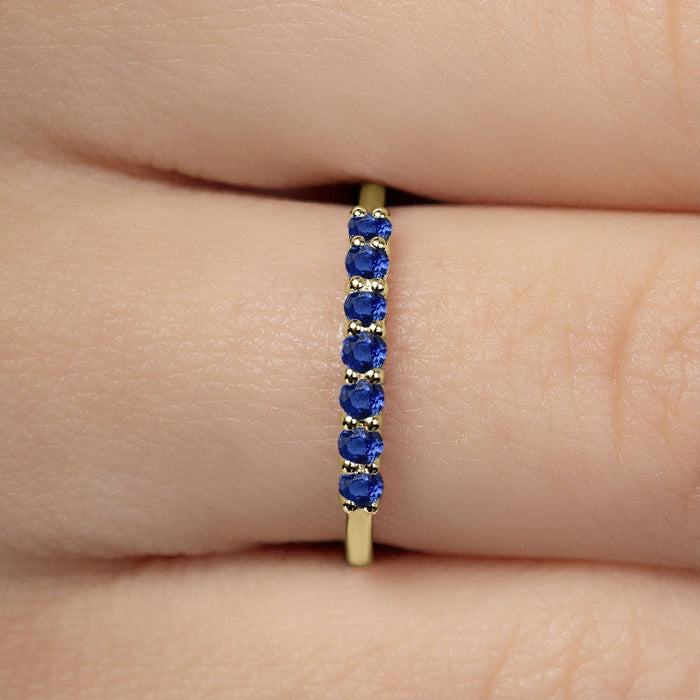 Yellow gold vadha ring set with 7 sapphires