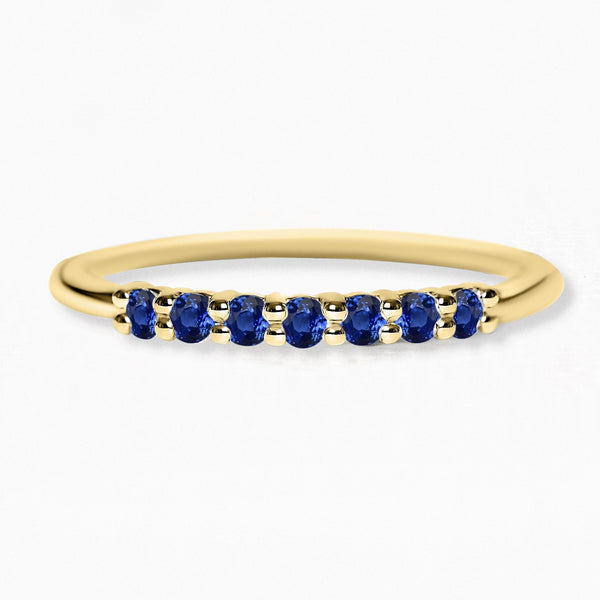 Yellow gold vadha ring set with 7 sapphires