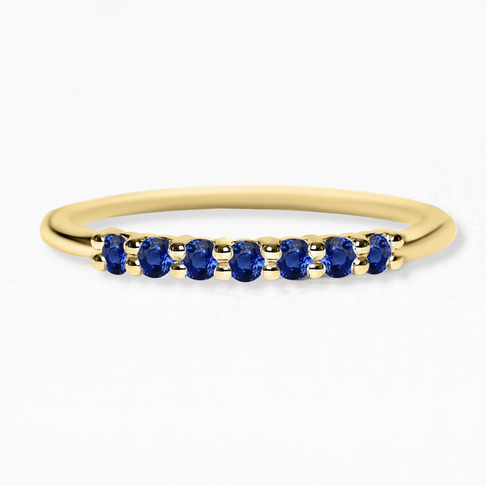 Yellow gold vadha ring set with 7 sapphires