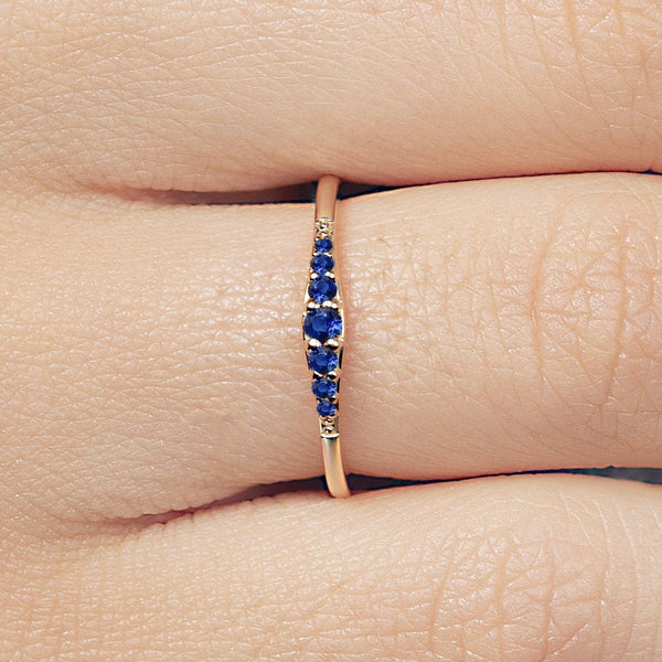 Yellow gold Sushma ring set with sapphires