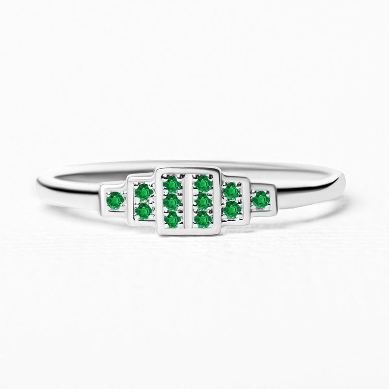 Brami ring in white gold set with emeralds