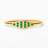 Yellow gold Brami ring set with emeralds