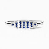 Geometric ring brami XL in white gold set with natural sapphires