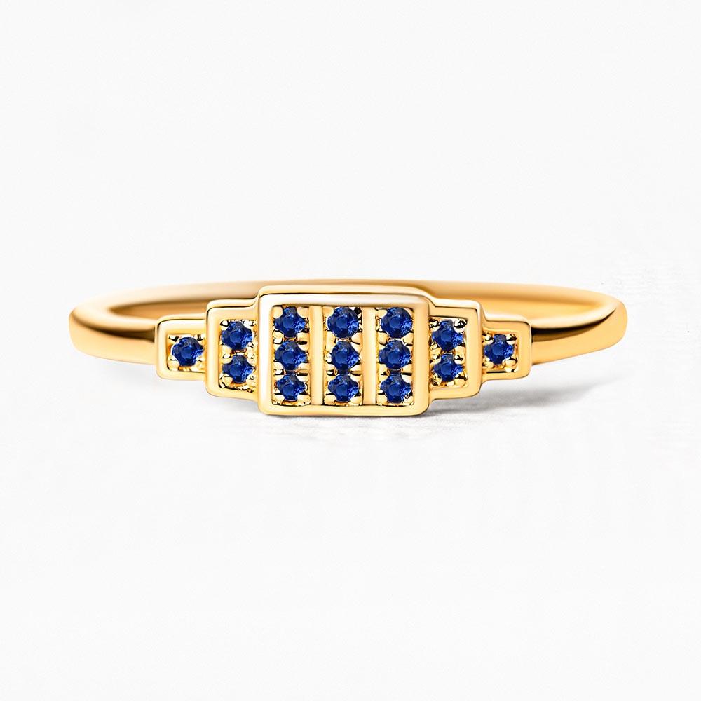 Geometric ring brami XL in yellow gold set with natural sapphires