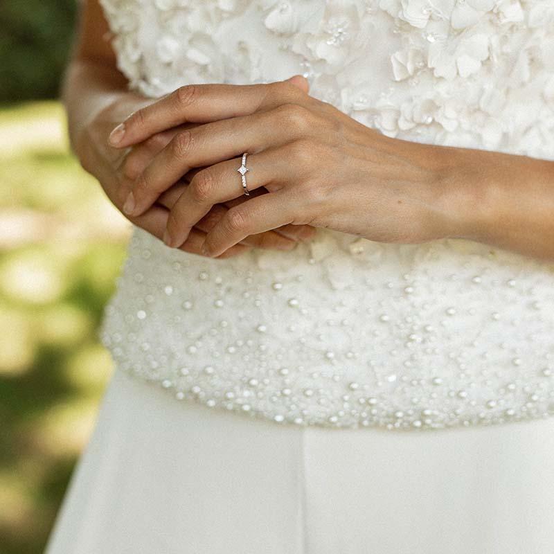 engagement ring with diamond cut princess paved with diamonds