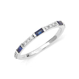 Semi eternity ring with sapphire and round diamonds in 18ct white gold