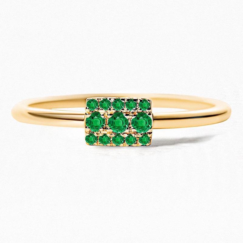 Geometric emerald ring