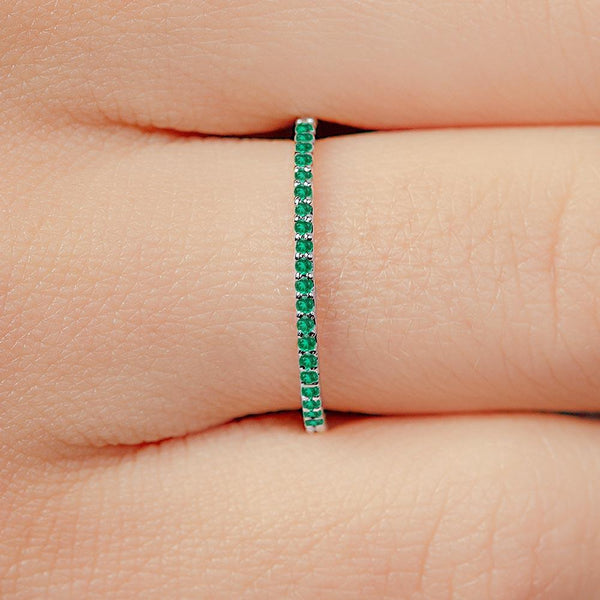 shadi eternity ring in white gold paved with emeralds