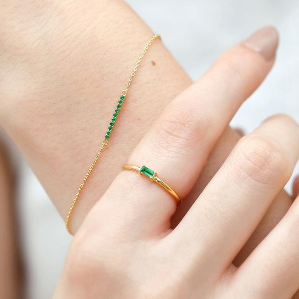emerald long bar bracelet and emerald baguette ring