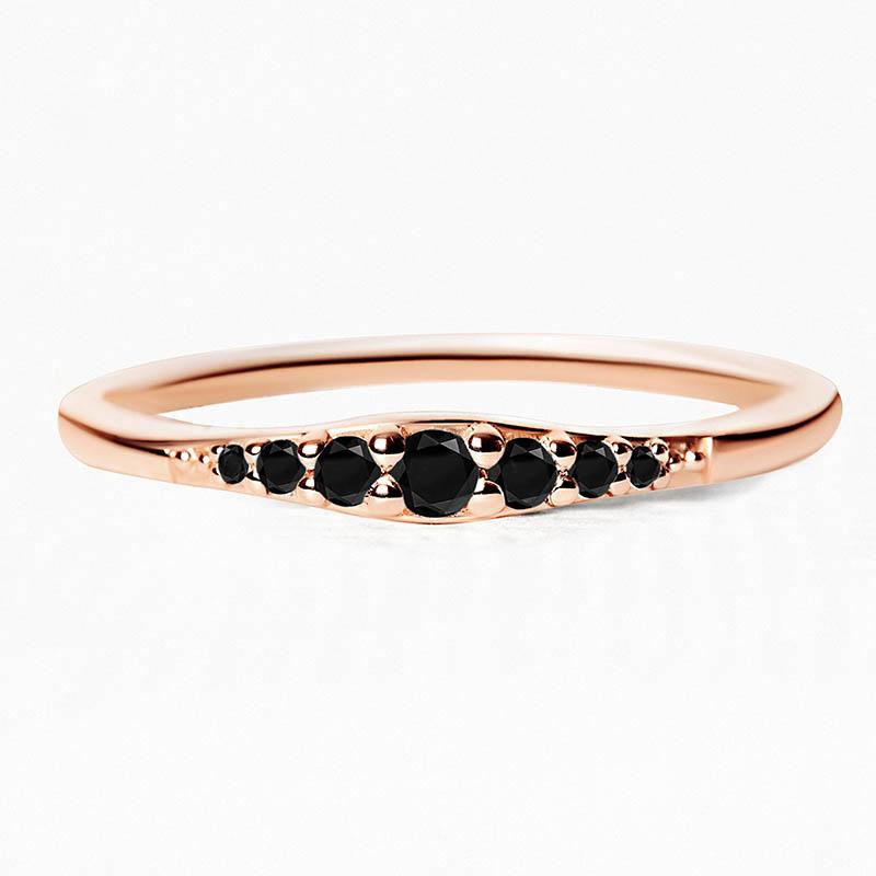 Sushma ring in rose gold set with 7 black diamonds