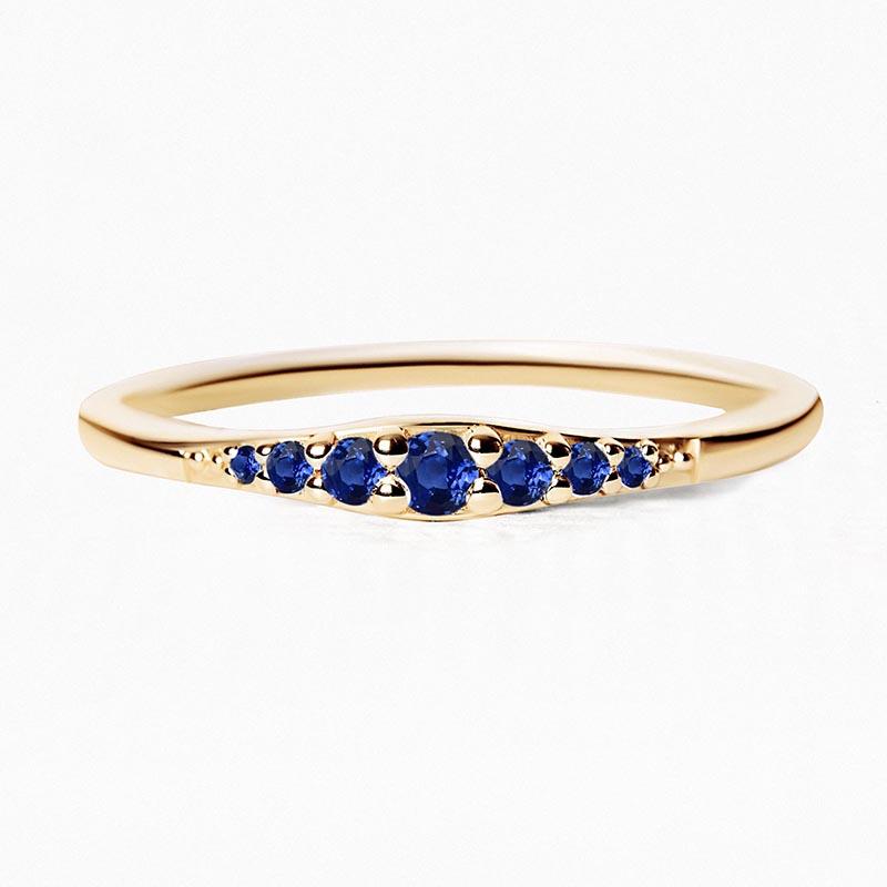 Yellow gold Sushma ring set with sapphires