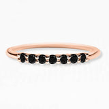 Vadha ring in rose gold set with 7 natural black diamonds