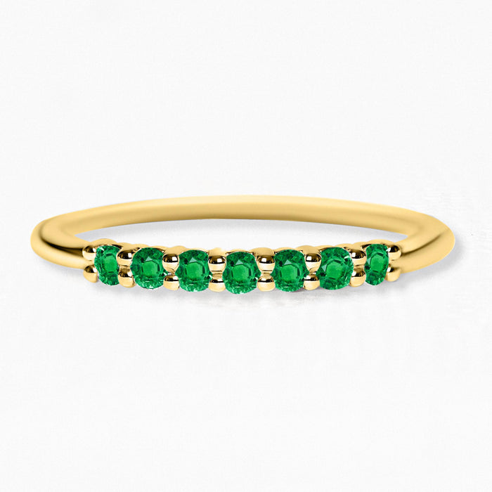 Yellow gold vadha ring set with 7 emeralds